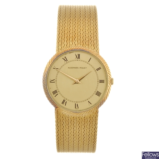 (53825) An 18k gold manual wind gentleman's Audemars Piguet bracelet watch.