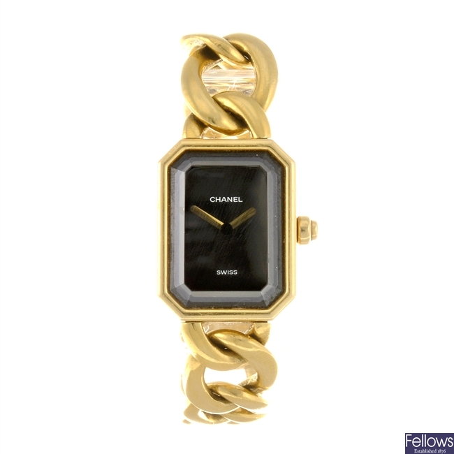 (108106473) An 18k gold quartz lady's Chanel bracelet watch.