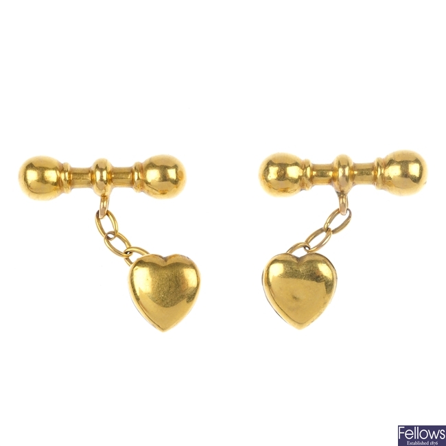 A pair of early 20th century 15ct gold heart cufflinks.