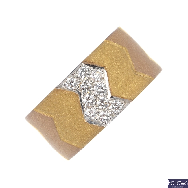 An 18ct gold diamond band ring. 