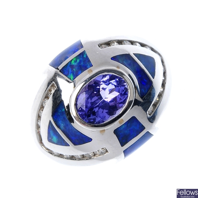 A tanzanite, opal doublet and diamond dress ring.
