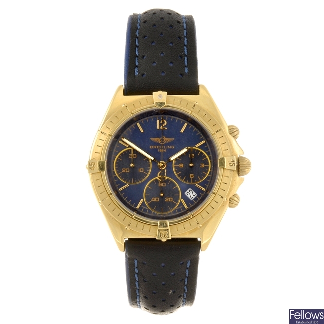 An 18k gold quartz gentleman's Breitling Chronomat wrist watch.