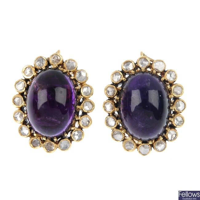 A pair of amethyst and diamond cluster ear clips.