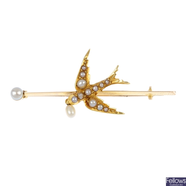 An early 20th century 15ct gold split pearl swallow brooch.