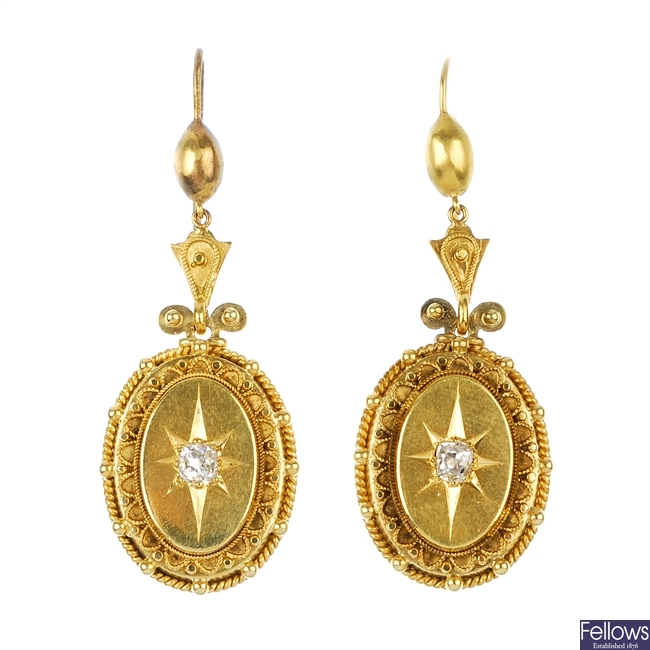 A pair of late 19th century gold diamond ear pendants.