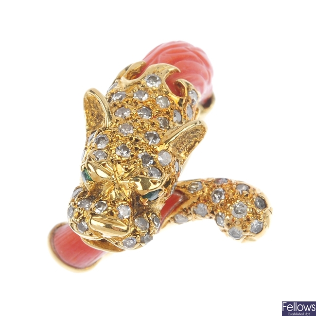 A coral and diamond leopard ring.