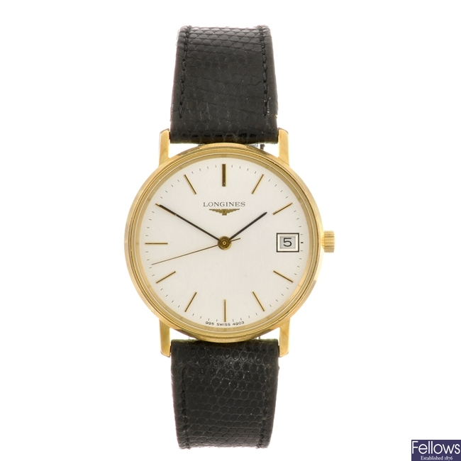 A gold plated manual wind gentleman's Longines wrist watch.