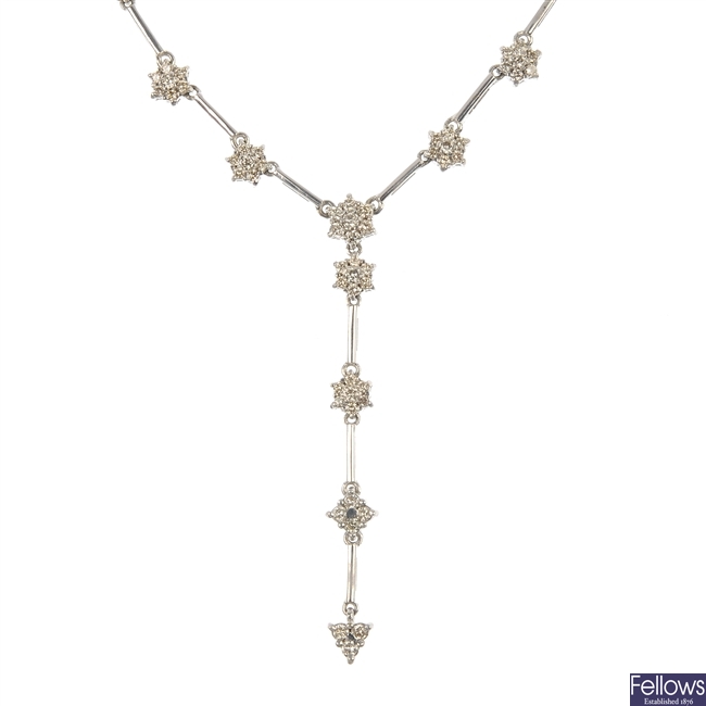 An 18ct gold diamond cluster necklace. 