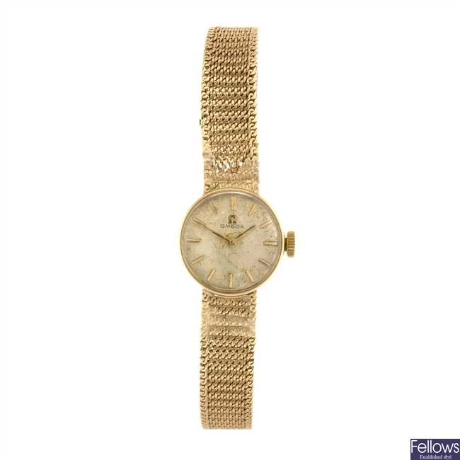 A 9ct gold manual wind lady's Omega bracelet watch.