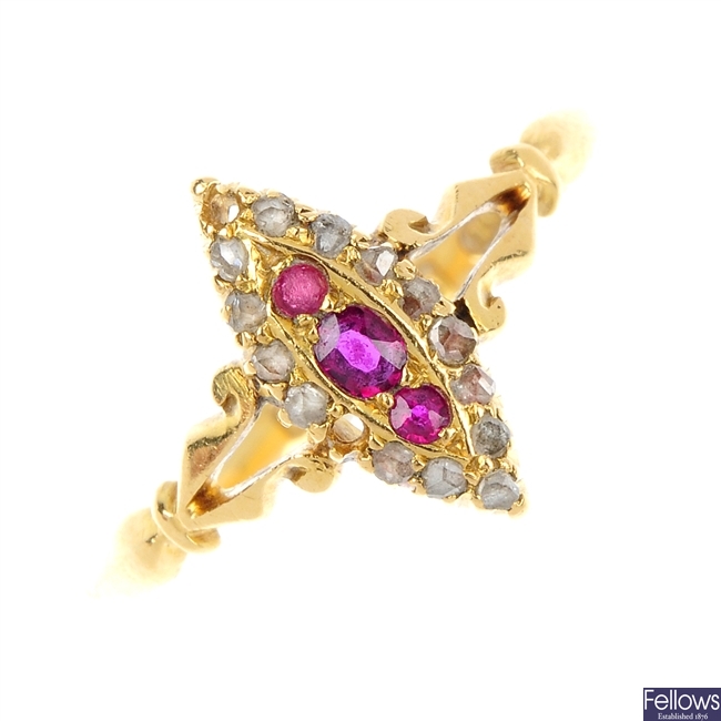 An Edwardian 18ct gold ruby and diamond cluster ring.