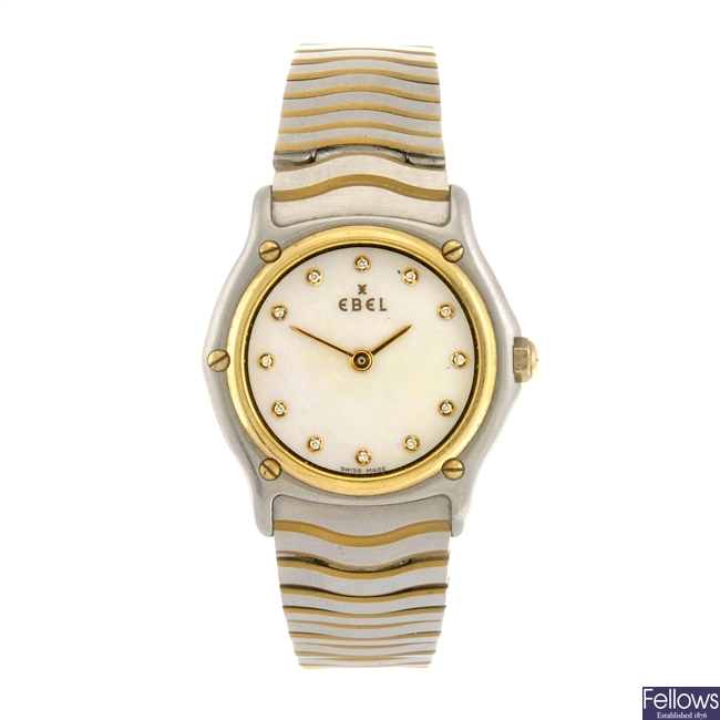 (304294047) A bi-metal quartz lady's Ebel Classic Wave bracelet watch.