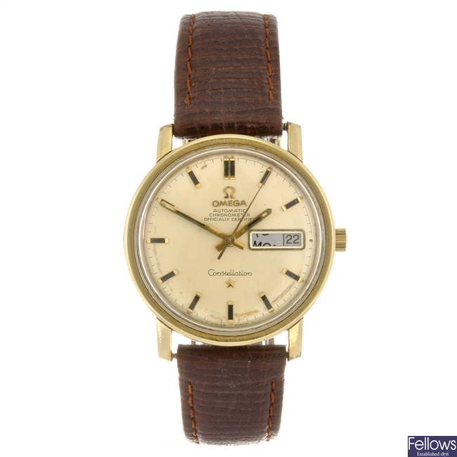 A gold plated automatic gentleman's Omega Constellation wrist watch.