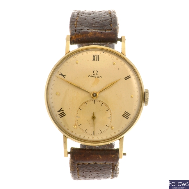 An 18k gold manual wind gentleman's Omega wrist watch.