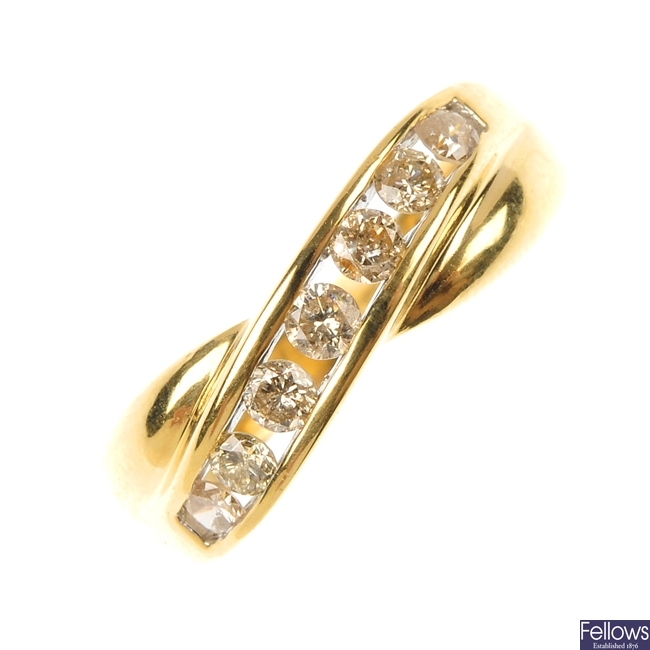 An 18ct gold diamond crossover band ring. 