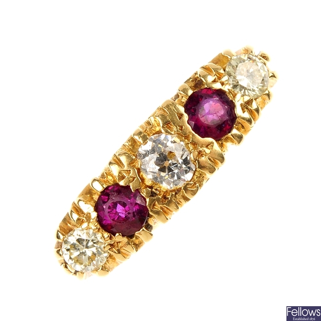 A ruby and diamond five-stone ring.