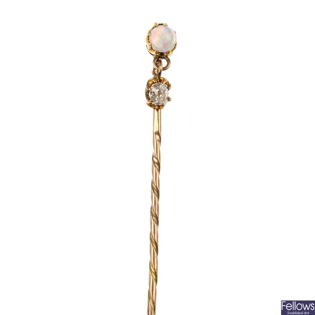 An opal and diamond stickpin.