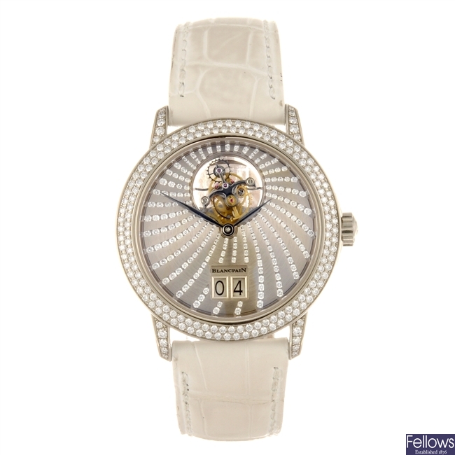 An 18k white gold automatic lady's Blancpain Léman Tourbillon Large Date wrist watch.