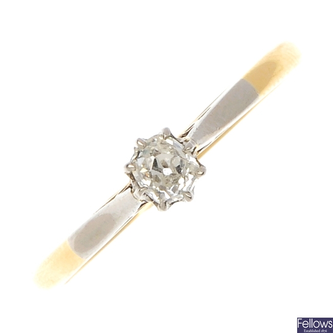 An 18ct gold and platinum diamond single-stone ring.