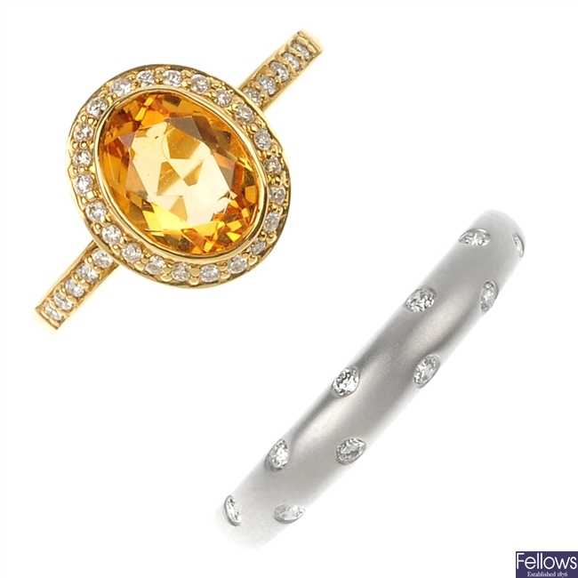 An 18ct citrine and diamond ring and an 18ct diamond band ring.