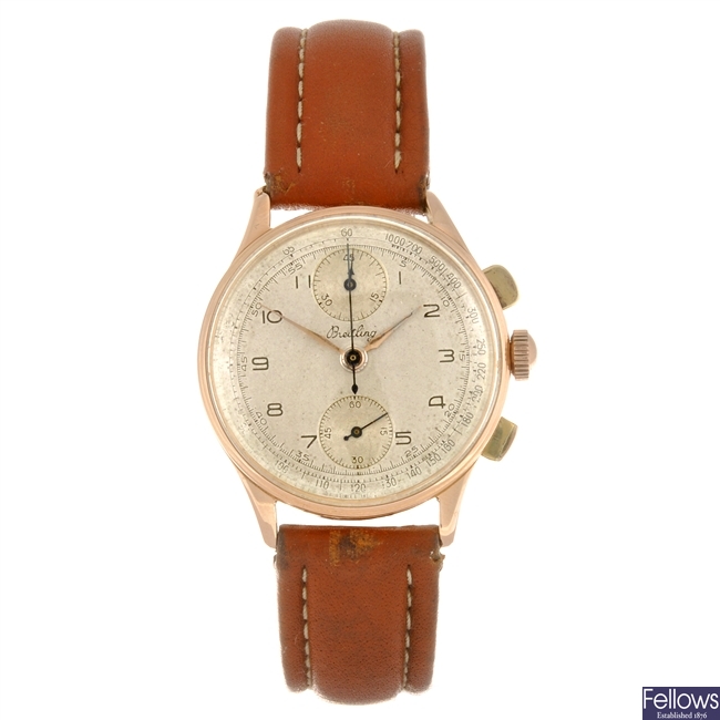 An 18k gold manual wind gentleman's Breitling wrist watch.