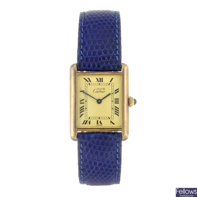 A gold plated quartz Must De Cartier Tank wrist watch.