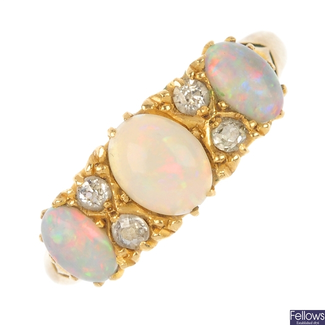 An early 20th century 18ct gold opal and diamond dress ring.