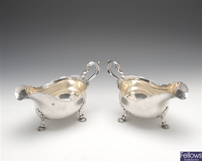 A George III pair of large silver sauce boats.