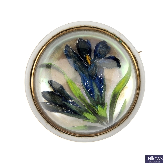 An early 20th century rock crystal reverse carved intaglio floral brooch.