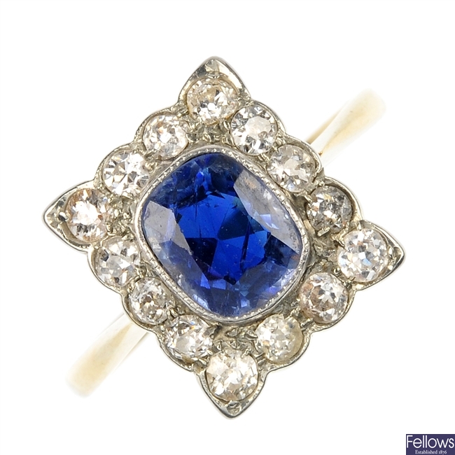 A mid 20th century platinum and 15ct gold sapphire and diamond ring.