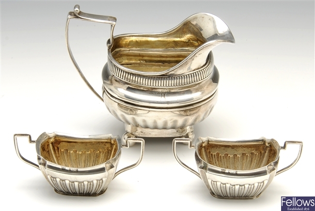 A George III silver cream jug & Edwardian silver salts.