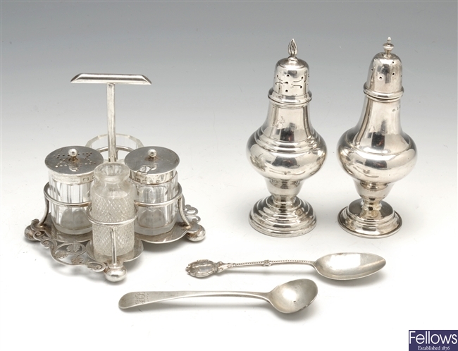 A selection of silver condiments, posy holder, two napkin rings, cased knives etc.