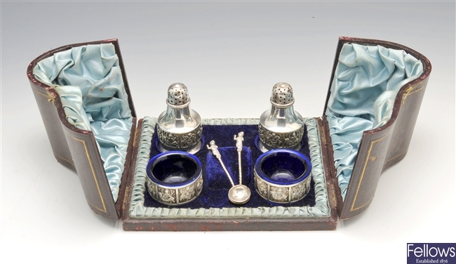 A late Victorian silver matched condiment set.