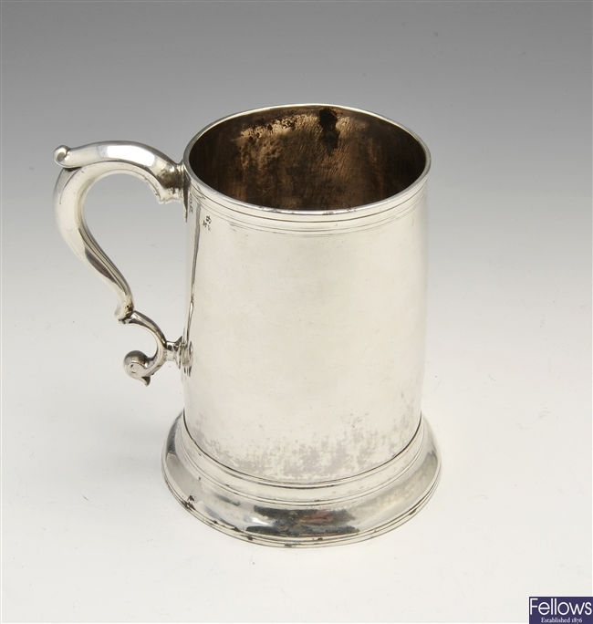 A George III Newcastle silver mug.