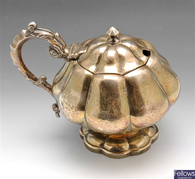A William IV silver mustard pot.