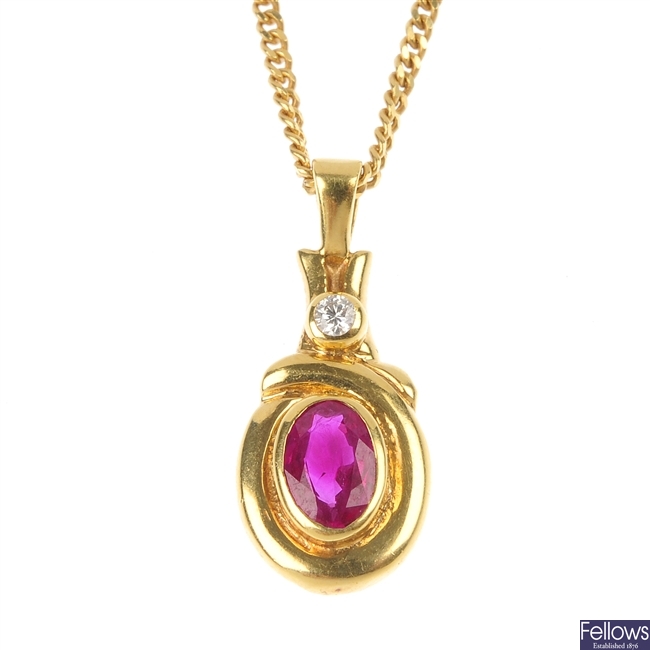 An 18ct gold ruby and diamond pendant. 