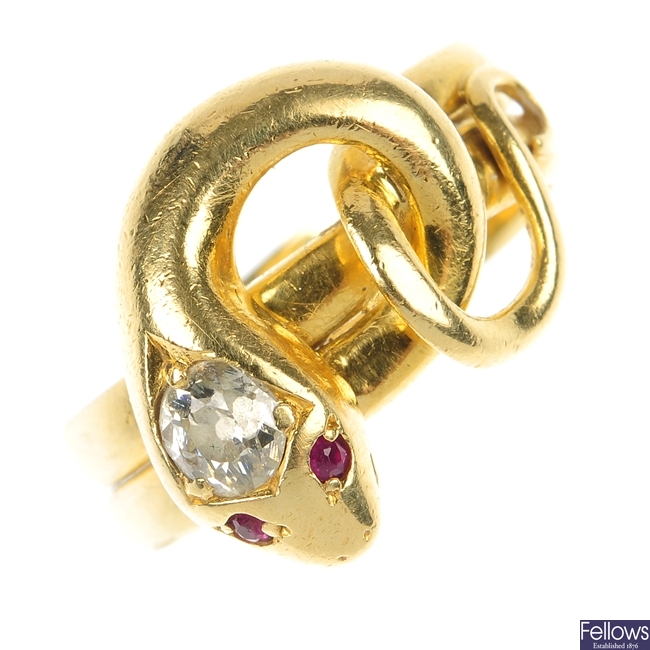 A diamond and ruby snake ring.