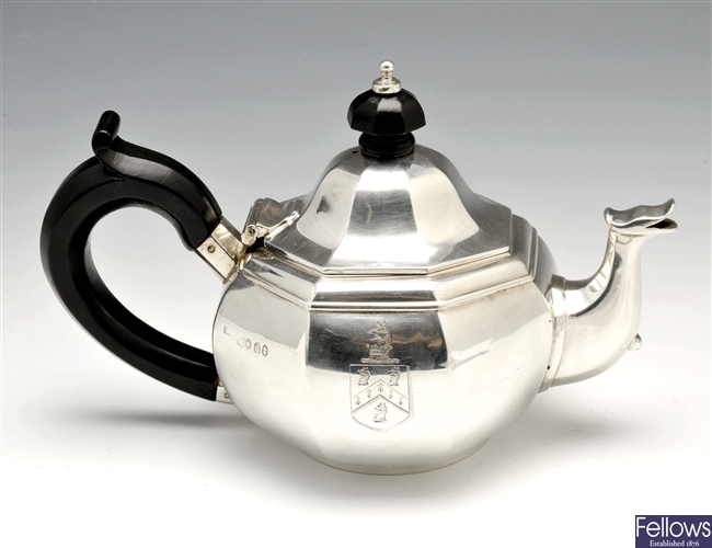 A George IV silver bachelor teapot.