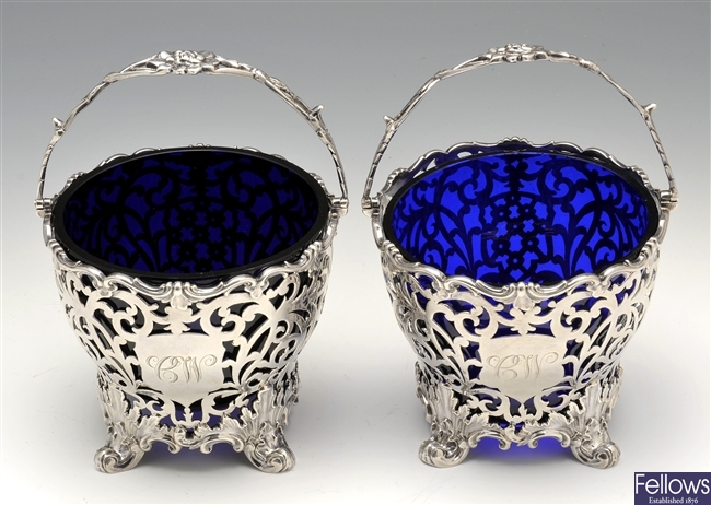 A pair of Victorian silver sugar baskets.