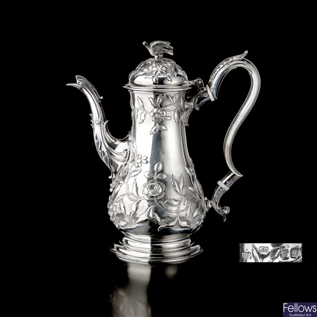 An early George III coffee pot with early 19th century silver handle.