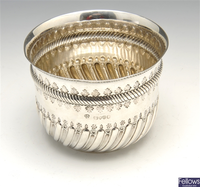 A Victorian silver bowl with George II coin set base.
