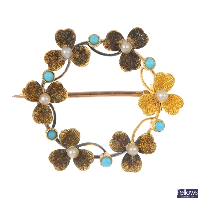 An early 20th century 15ct gold turquoise and seed pearl wreath brooch.