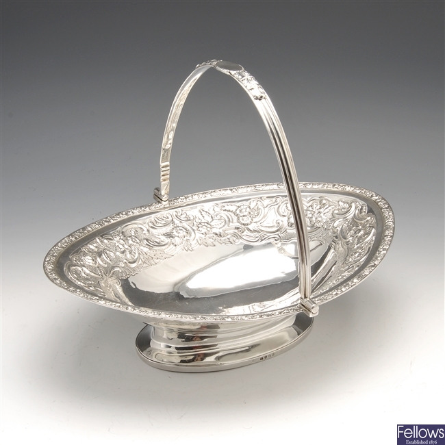 A George III silver swing handled bread basket.