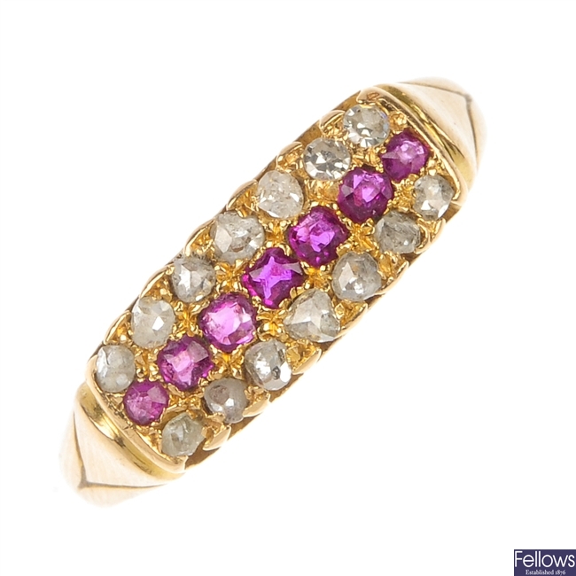 A late Victorian 18ct gold diamond and ruby three-row ring.