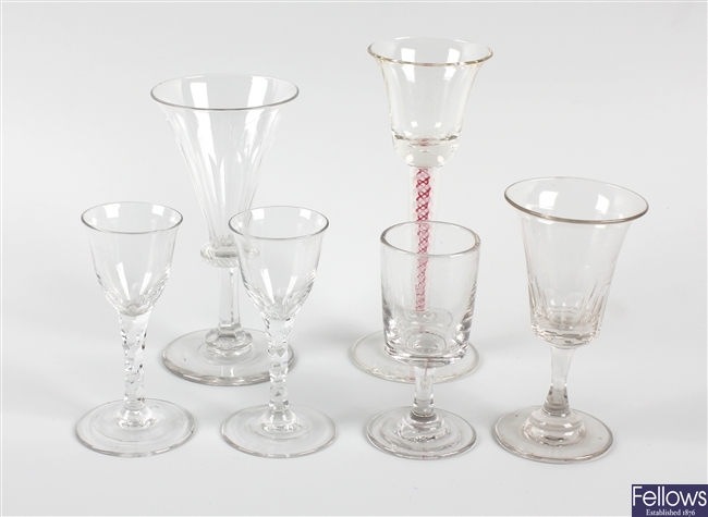 A group of assorted drinking glass