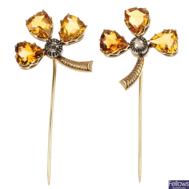 A pair of mid 20th century citrine and diamond clover stickpins.