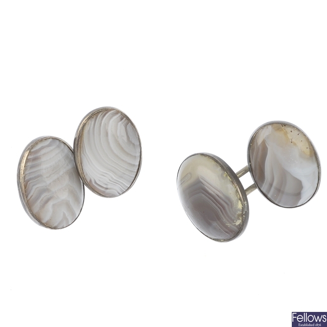 A pair of agate cufflinks and a further pair of cufflinks.