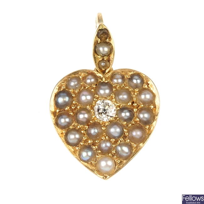 An early 20th century gold diamond and split pearl heart pendant.