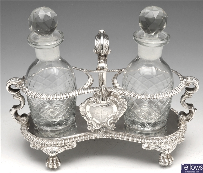 A George III silver oil and vinegar stand.
