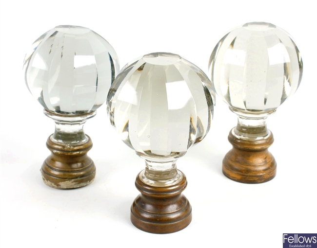 A set of three large early 20th century clear glass door knobs