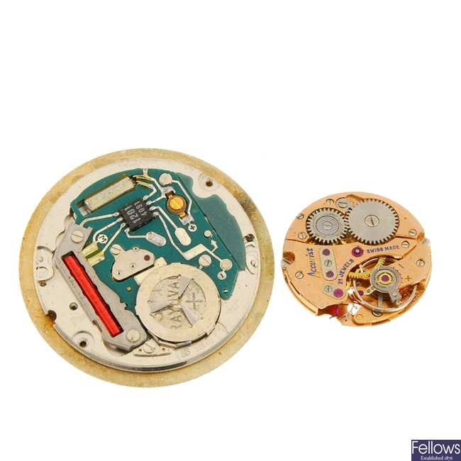 A group of assorted watch movements.